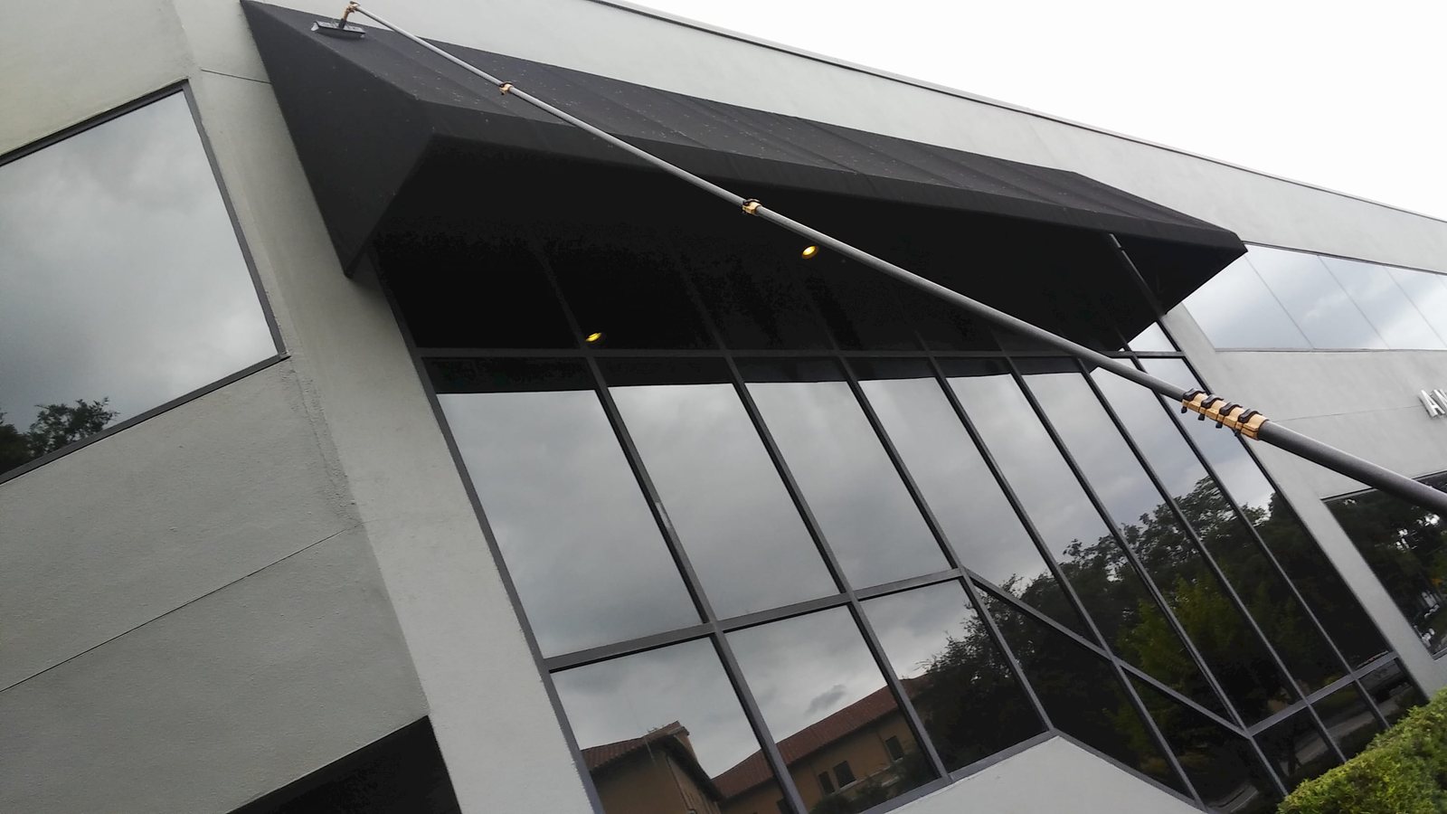 SqueegeeCo window cleaning